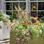 Цветочные контейнеры и приподнятые клумбы: 10 классных идей для сада
